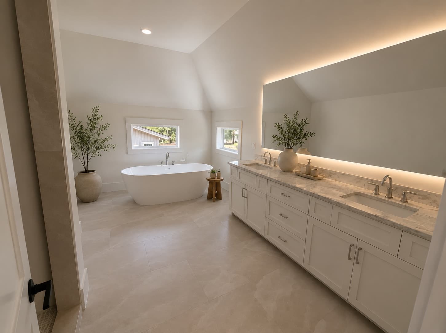 Primary bathroom vanity and bath detail at 16 Indigo Lane
